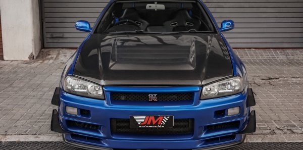 NISSAN SKYLINE GT-R R34 NISMO -CARBONO EXTERIOR VISIBLE-